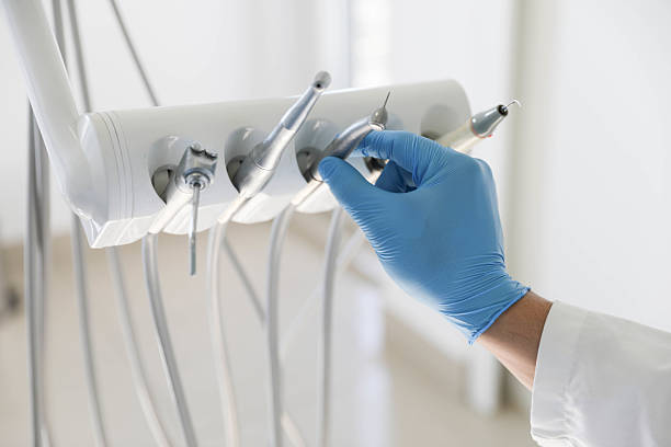 Professional Tooth Extraction technician working in Briggs, OK